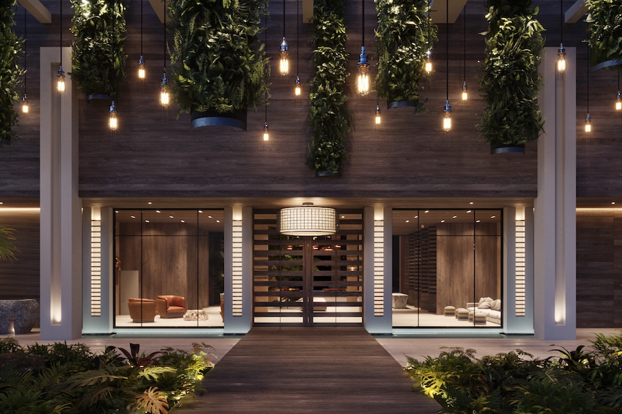 Grand Hyatt Grand Cayman Resort Entrance slatted wood doors hanging plants biophilic wood walkway